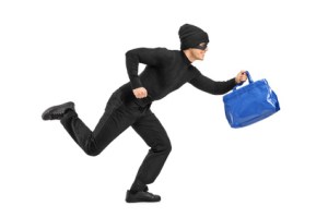 Thief running with a stolen purse